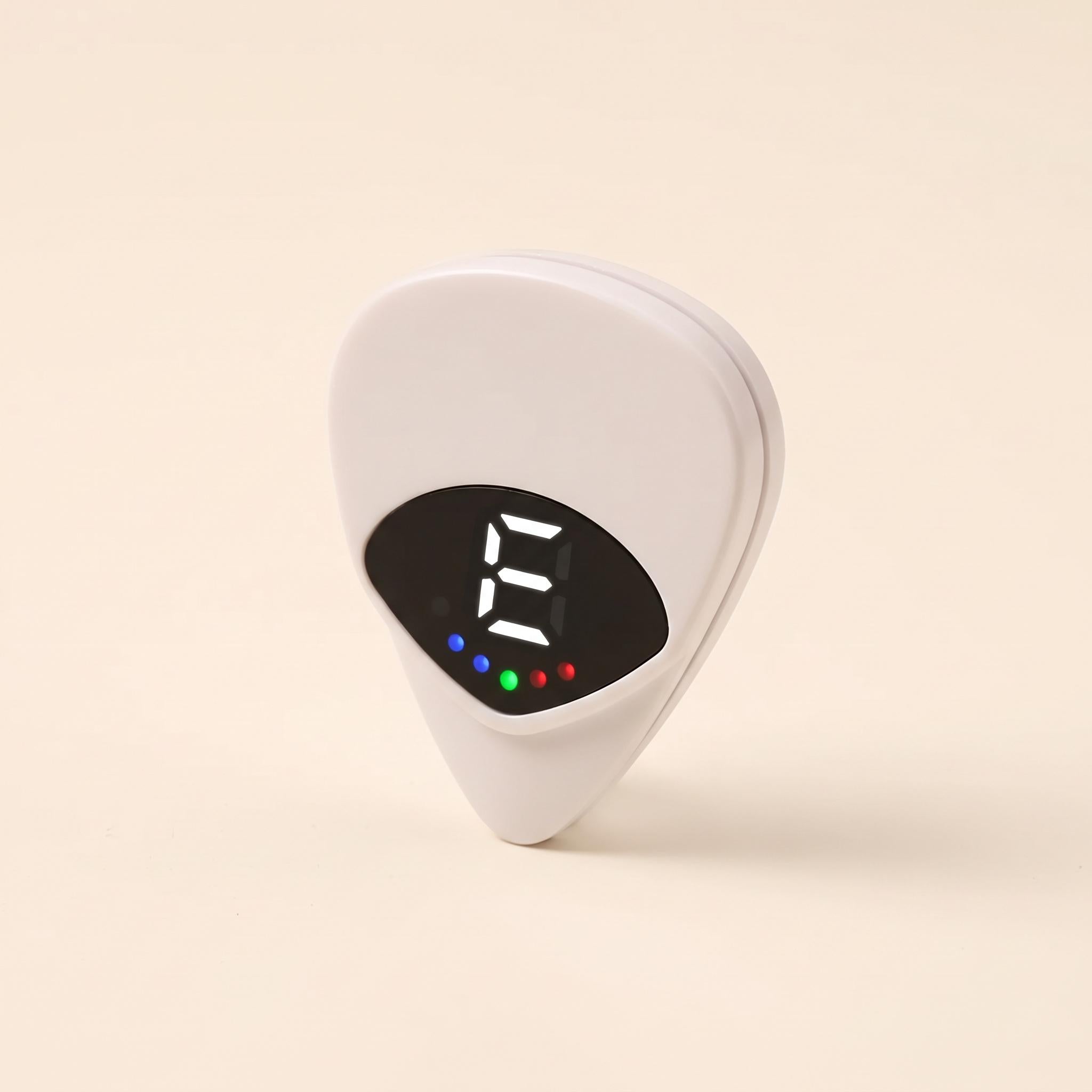 White pick tuner with its black display