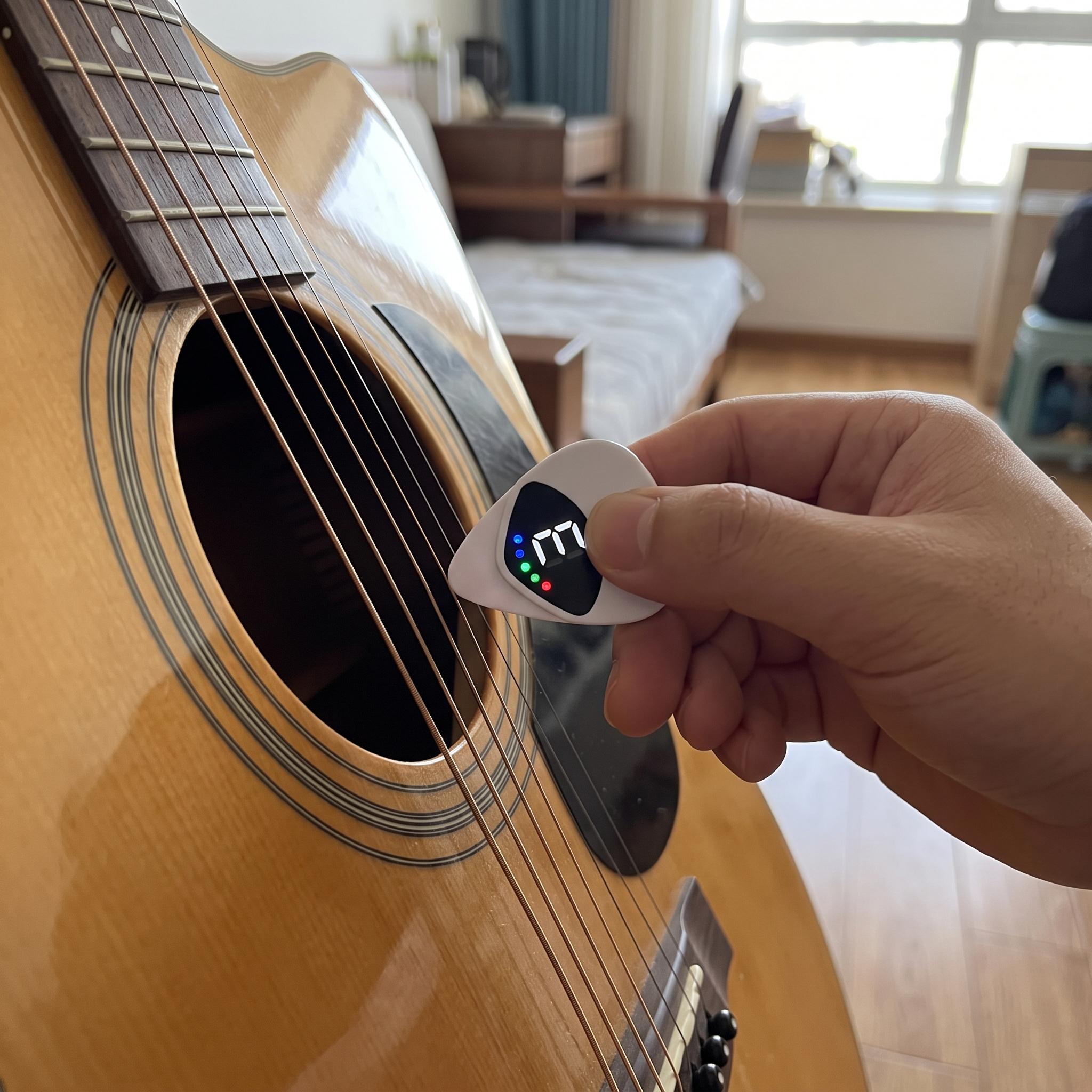 Gentle tuning pluck on an acoustic guitar