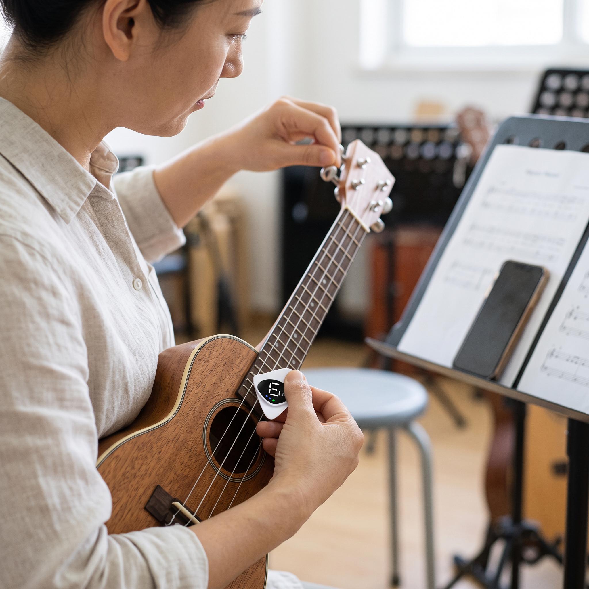 Chordwell pick tuner beside a ukulele